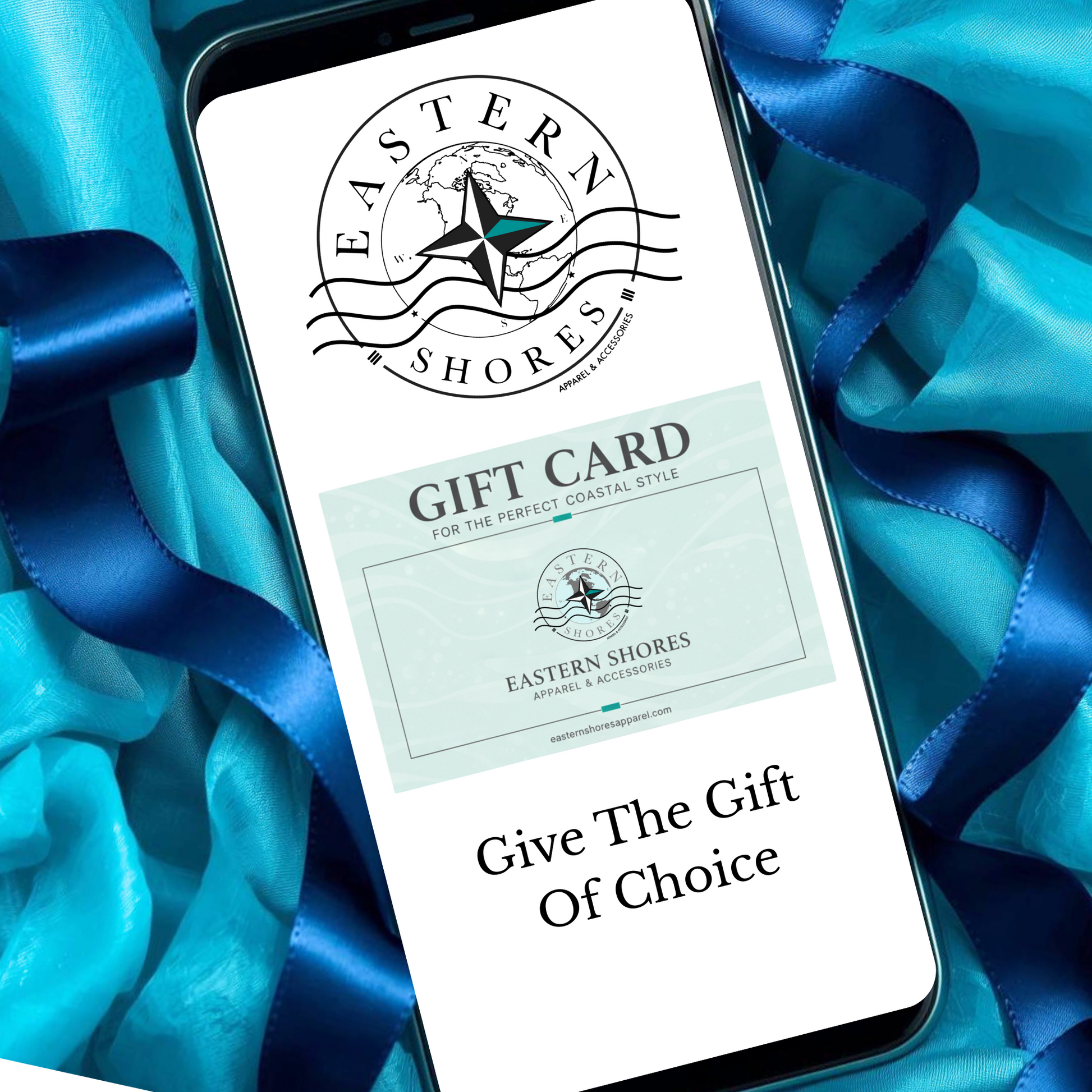 Phone displaying an Eastern Shores gift card surrounded by blue ribbons and teal organza