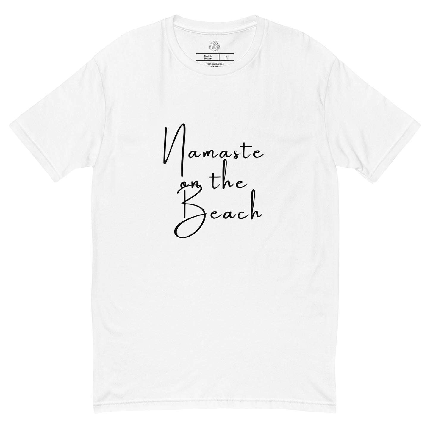 White t-shirt with  'Namaste on the Beach' printed on it, on a white background