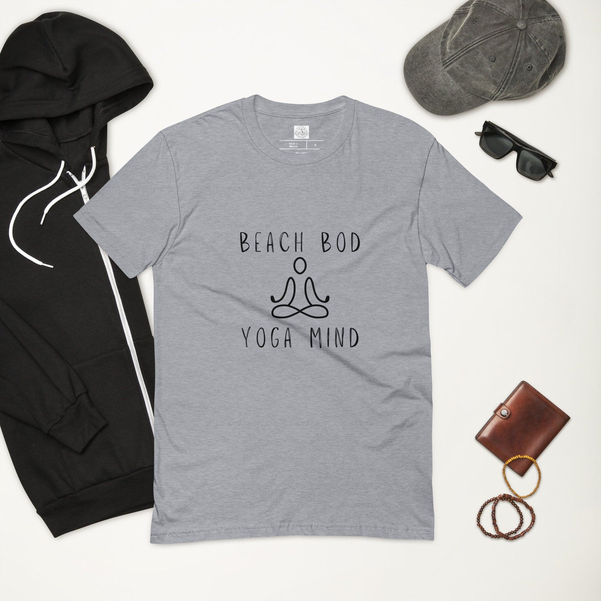 Soft heather grey t-shirt with 'BEACH BOD YOGA MIND' printed on it.